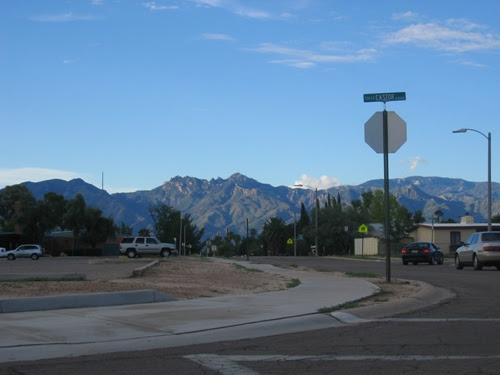 The mountains as seen from an intersection next to a nearby school.