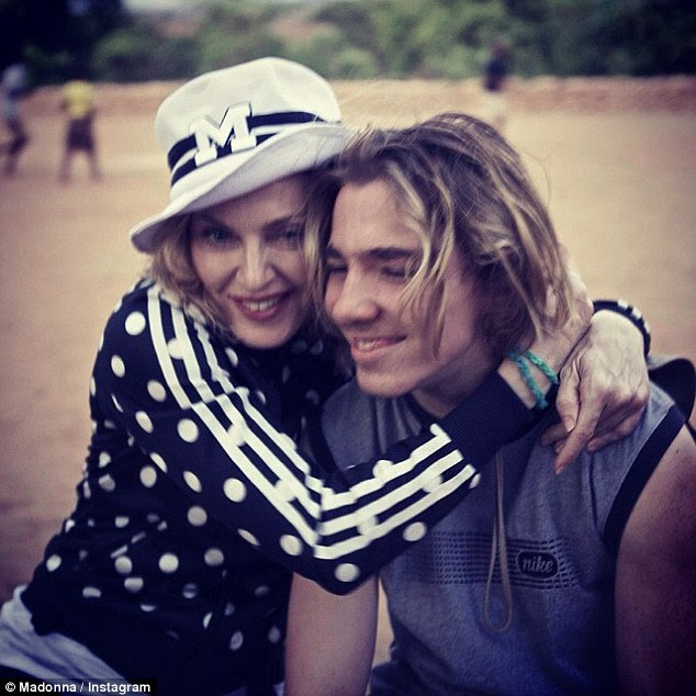 Madonna embraces son Rocco in photo from Thanksgiving trip ...