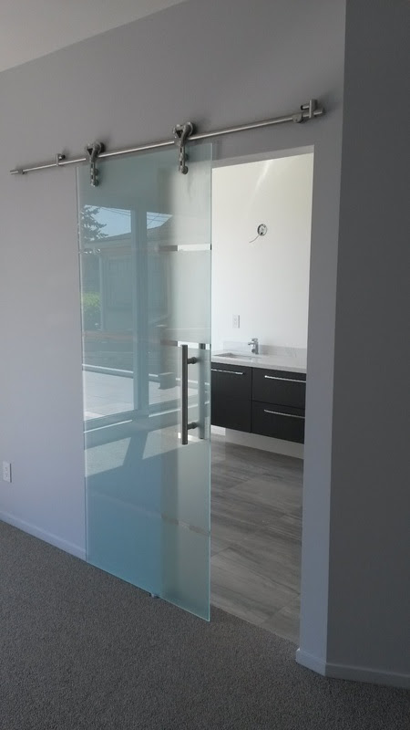 Sliding glass barn doors
