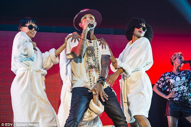 Chart-topper: Pharrell Williams' hit song Happy tops a survey of the most popular family car songs