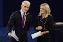 Moderators Anderson Cooper, of CNN, and Martha Raddatz, of ABC News talk to the audience before the second presidential debate at Washington University in St. Louis, Sunday, Oct. 9, 2016. (AP Photo/Julio Cortez)