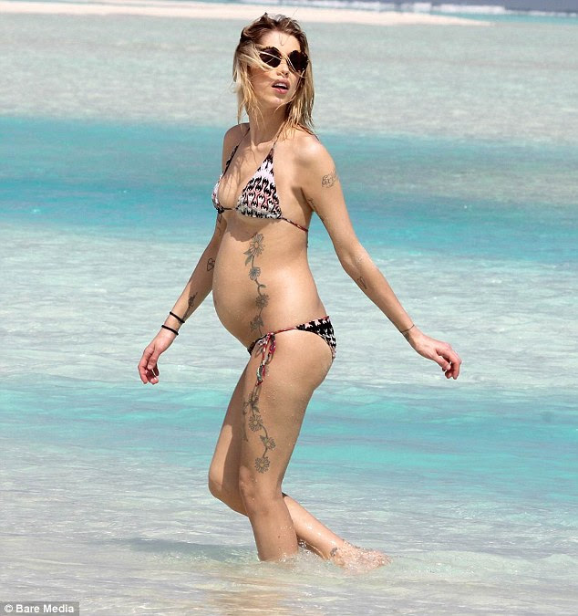 Soaking up the rays: The pair were staying at the Cocoa Beach Resort in the Maldives