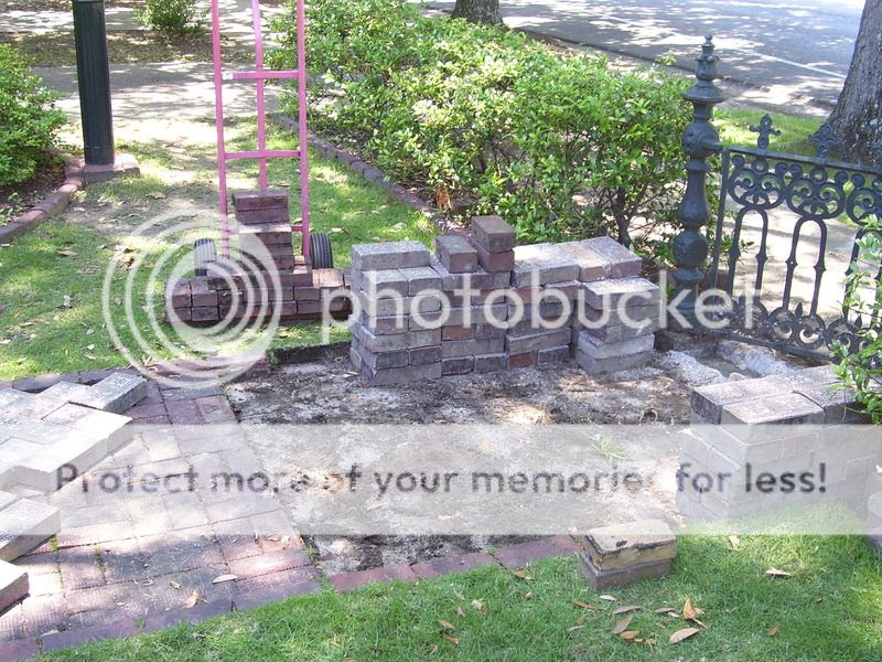 http://i43.photobucket.com/albums/e386/brickpaver/removing%20bricks%20in%20front.jpg