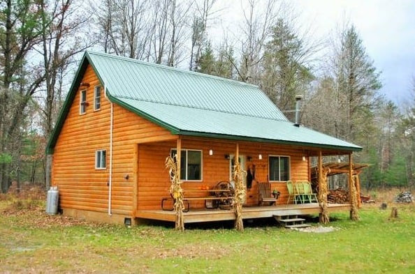 Solar Off-Grid Log Cabin on 20 Acres For Sale