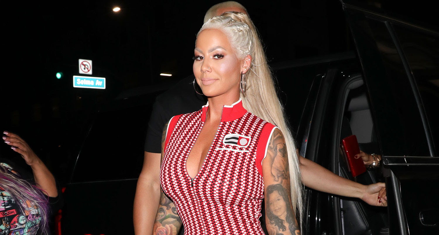 Amber Rose Shows Off Her Long Blonde Hair & Curves at the 