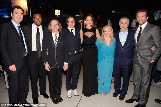 So much to celebrate: No doubt (L-R) Chris Tucker, David O Russell, Jennifer Lawrence, Robert DeNiro and Bradley Cooper would have raised a toast to their success