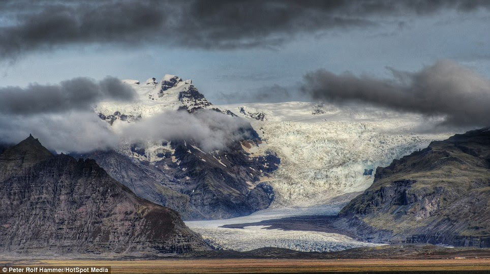 Frozen: A glacier winds its way down the mountainside forming what looks like a beautiful white river