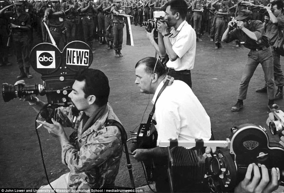 Pictured is Elmer Lower, who later became the president of ABC News. He worked as a sound man while in Ho Chi Minh City, which was then known as Saigon