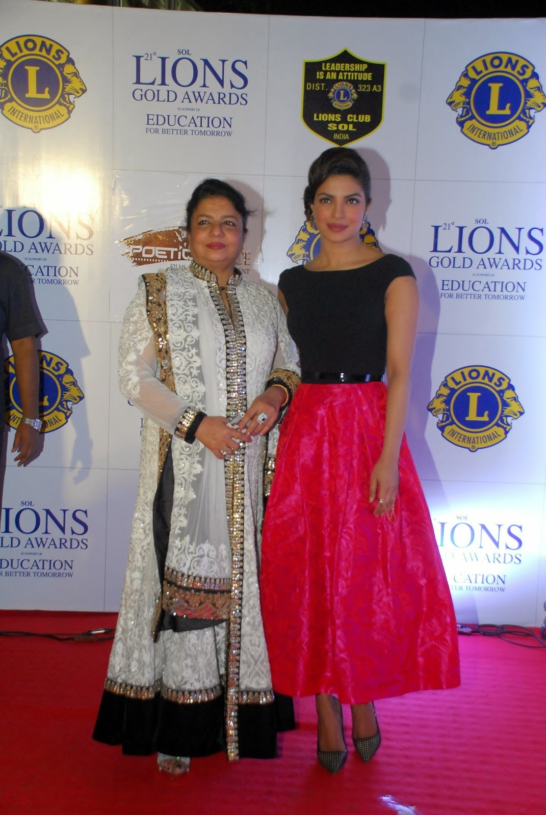 Actress Priyanka Chopra In Black Top Red Skirt At Awards Function