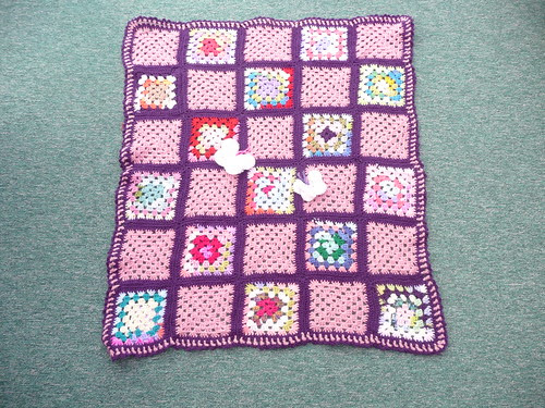I love the purple yarn, it really makes the Squares stand out. Thank you very much!
