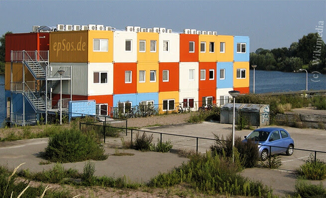 shipping containers are used to construct contemporary buildings for 
