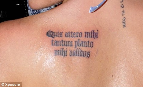  the 25-year-old former WAG popped into one of the park's tattoo 