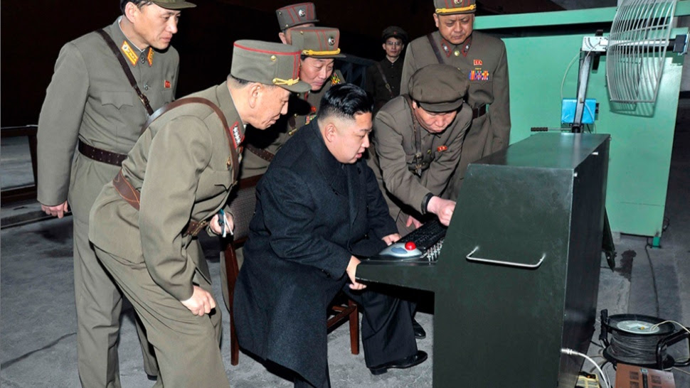 North Korea, Kim Jong-un using a computer