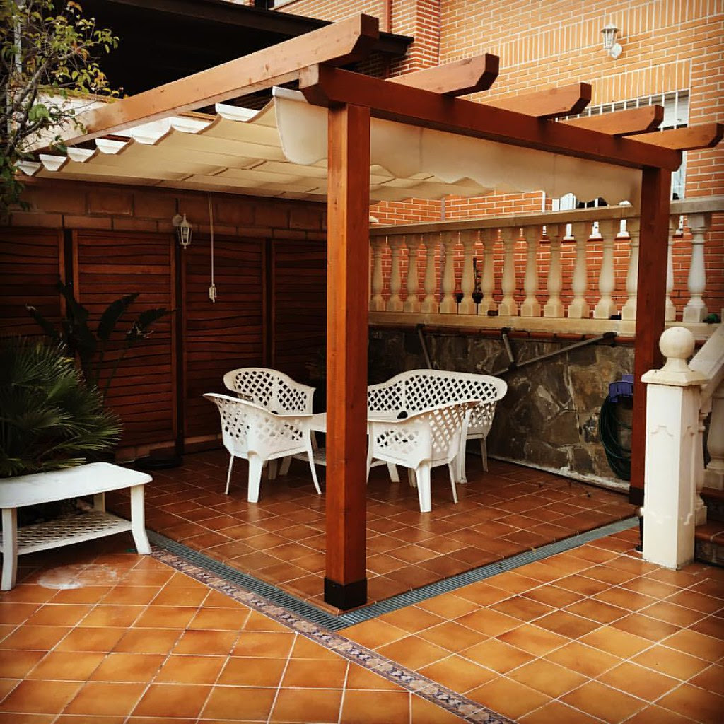 Pergolas de madera con toldo
