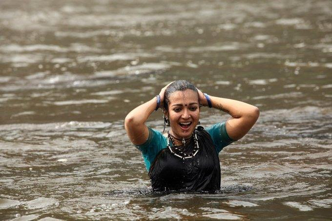 Tollywood Actress Hot Stills In Wet Black Saree Catherine Tresa