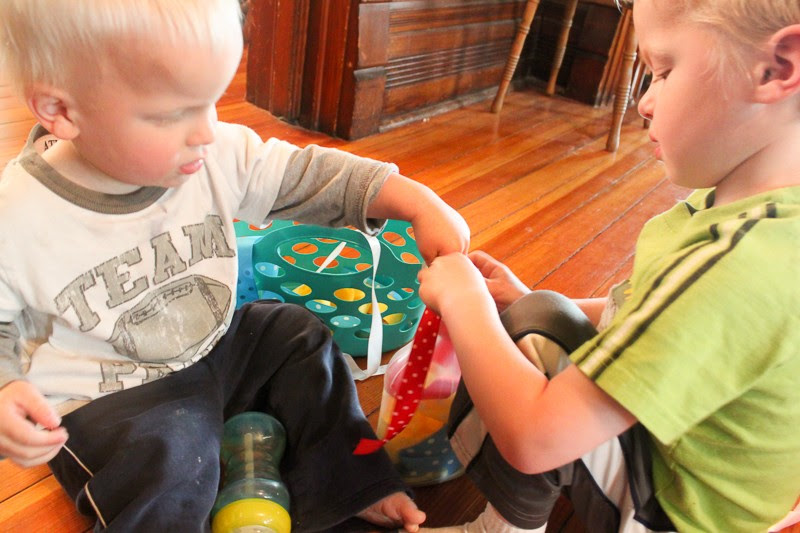 Fine motor play with ribbon -- great busy idea for toddlers to do
