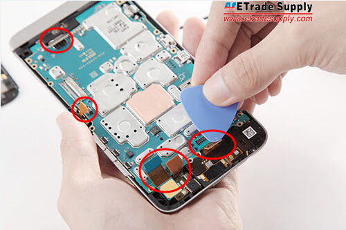 pry up flex cables and remove logic board