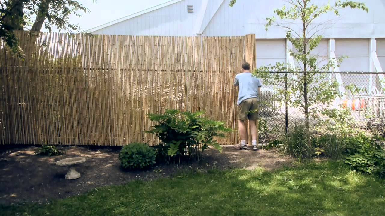 Installing a Bamboo Friendly Fence on a Chain Link Fence ...