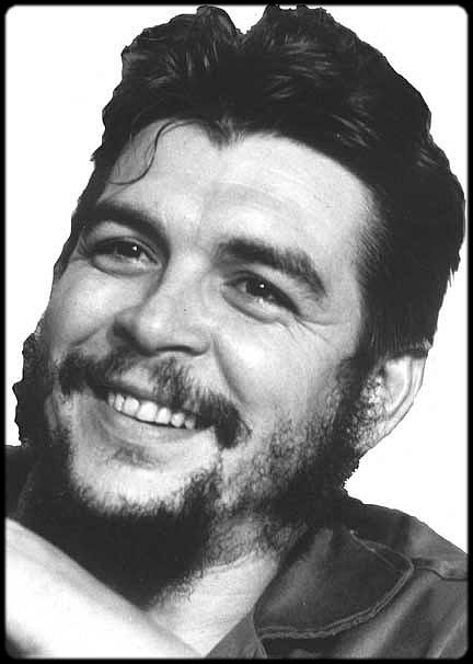 Che, smiling, probably thinking of how funny people look when straffed from the air