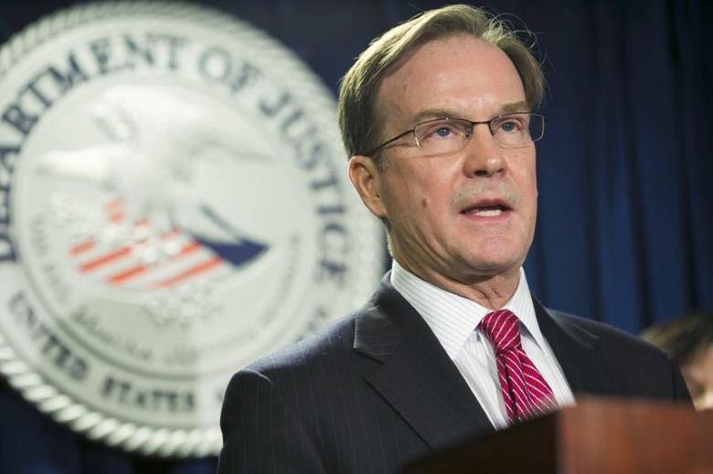 Michigan Attorney General William ''Bill'' Schuette speaks in Boston, Massachusetts, December 17, 2014. REUTERS/Dominick Reuter/File Photo