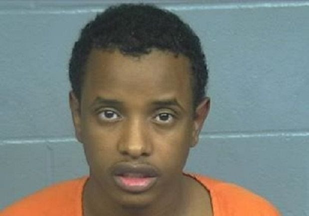 Abdirhman Ahmed Noor, a refugee from Somalia, is charged with two counts of attempted murder outside of an apartment complex in Aberdeen, S.D., but jumped bail and remains at large.