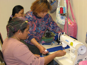 Phyu Phyu Aye, a Burmese refugee, teaches sewing at the Refugee Resource Center in Fort Wayne, In.
