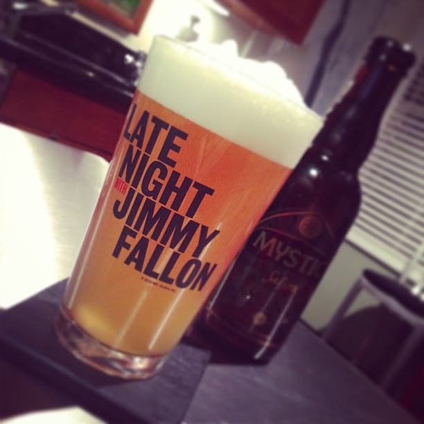 Late Night With Jimmy Fallon pint glass and beer.
