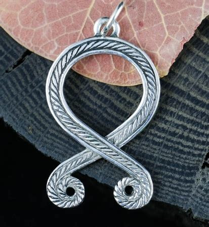 Here are tips on how to keep your sterling silver jewelry from tarnishing. TROLL CROSS, Odal Rune, pendant, sterling silver