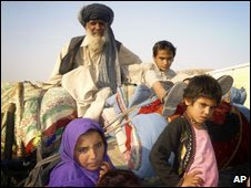 A family flee Waziristan region near the Afghan border ahead of fighting