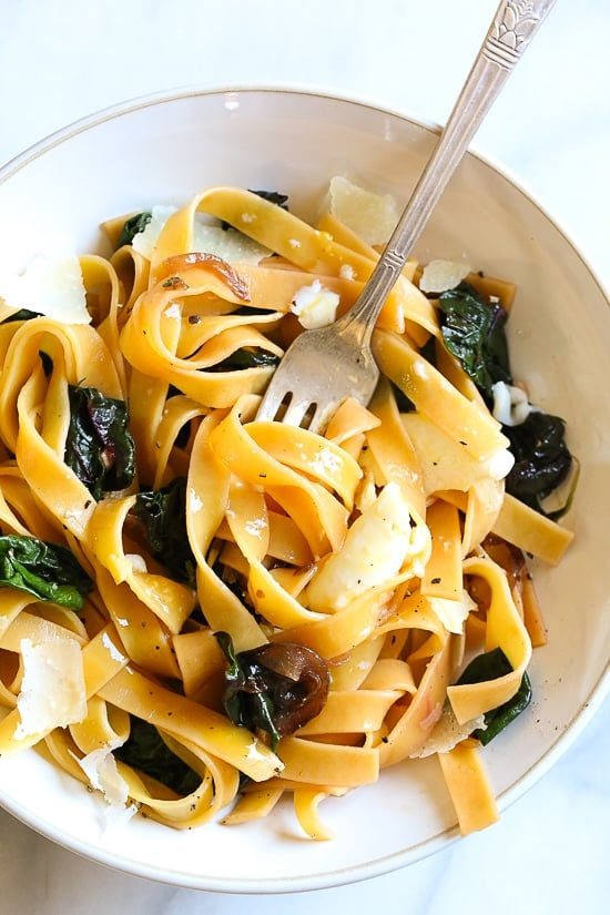 Pasta, greens and poached egg are one of my go-to, no-fuss weeknight combinations in the winter when I'm hungry and need dinner on the table quick. I always have eggs, pasta and some type of green vegetable on hand, for this I used Swiss chard, but spinach, escarole or kale would also work.