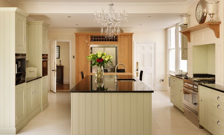 Harvey Jones Shaker kitchen painted in Farrow & Ball 'French Grey' with Oak and Zimbabwe worktops