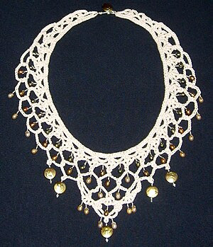 Necklace made from crochet lace, pearls, and s...