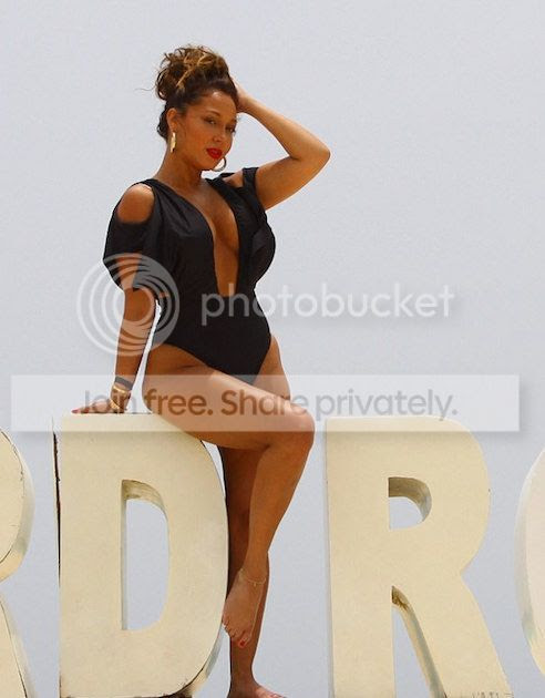  photo 40CA109700000578-4542422-Adrienne_Bailon_posed_in_a_stylish_black_bikini_on_holiday_in_th-m-10_1495733405323_zpsou8g7erb.jpeg