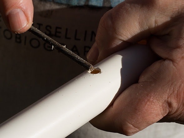 Filing the coil holes