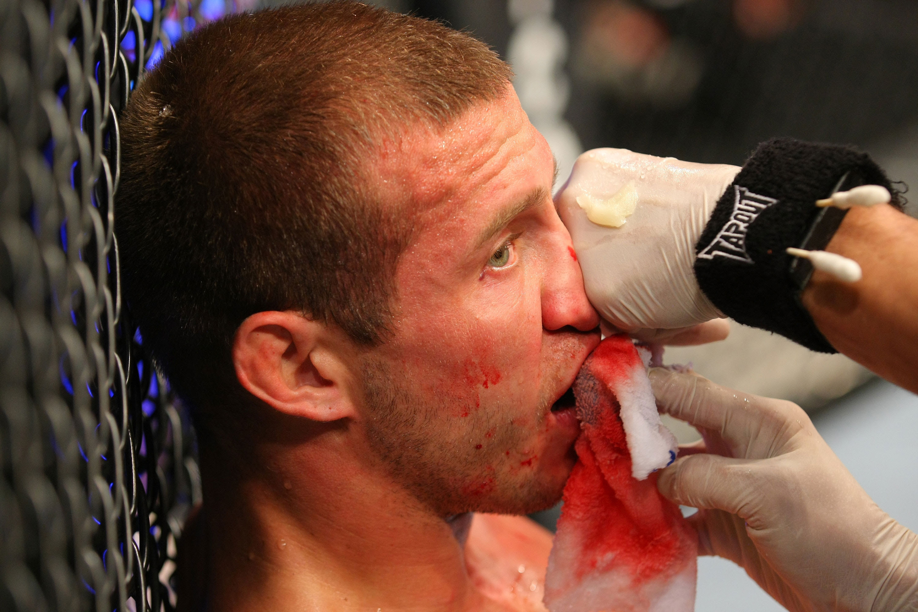 LAS VEGAS, NV - DECEMBER 30:  Donald Cerrone is inspected by cutmen inbetween rounds during the UFC 141 event at the MGM Grand Garden Arena on December 30, 2011 in Las Vegas, Nevada.  (Photo by Donald Miralle/Zuffa LLC/Zuffa LLC via Getty Images) *** Local Caption *** Donald Cerrone