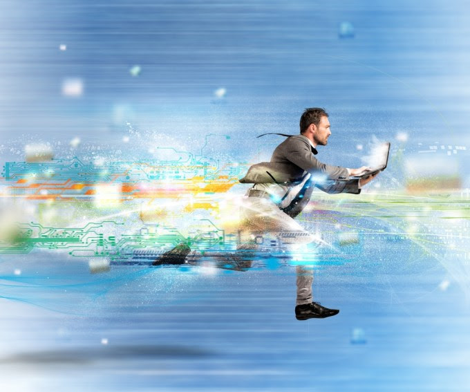 Business running with computer to illustrate speed.