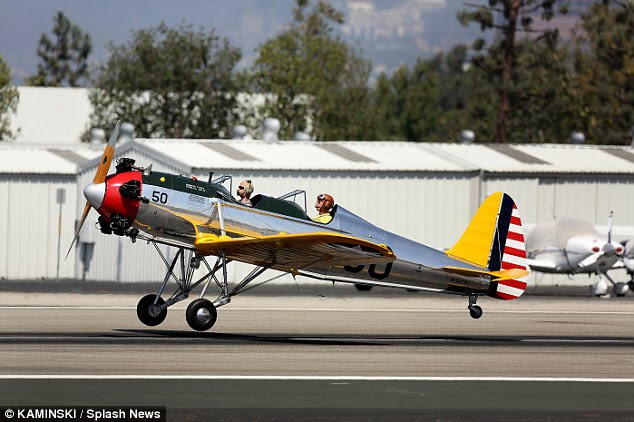 Preparing for take-off: The Fugitive star co-piloting the military training craft
