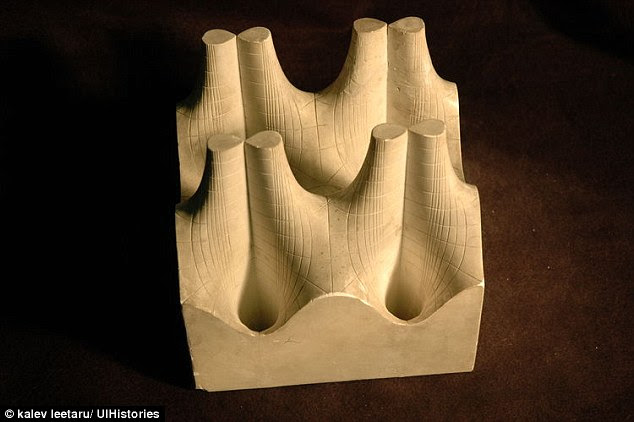 Each cross-section was cast separately, in a plaster made from powdered chalk. The layers were then stacked, glued together, and sanded until they were smooth