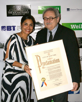 Photo by Christian Peguero Sam Beck receives a proclamation from New York City Council Member Diana Reyna in recognition of his service to North Brooklyn communities.