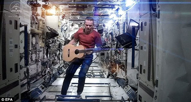 Hadfield, who retired as an astronaut last year, is one of mankind's most famous space explorers, known for his prolific tweeting and public appearances. He recreated David Bowie's Space Oddity song and video in space (still from YouTube shown), which is set to return to YouTube soon after being removed