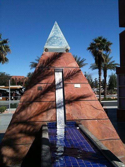 The saying "Symbols rule the world not words nor laws" means that you shouldn't listen to what "officials" or media says about power. Just look at the symbolism and imagery that's around you. Here's a momunent in Las Vegas that's basically a tribute to Illuminati rule.