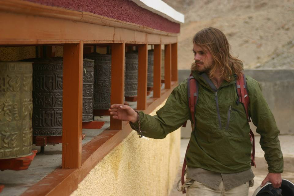 Cory Hall spinning Buddhist prayer wheels in Ladhak, India, 63 kb