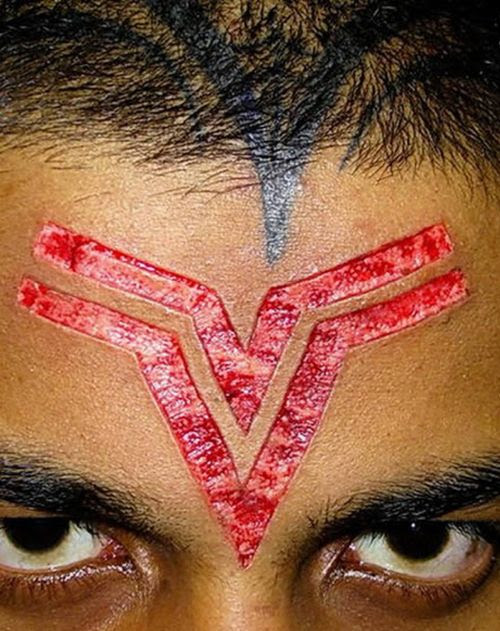 Extreme Scarification Tattoos (17 pics)