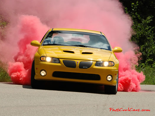 Fast Cool Cars Pontiac GTO smoldering the tires Burnouts