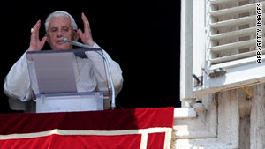 Pope Benedict XVI adresses the crowd during his Sunday Angelus prayer at the Vatican.