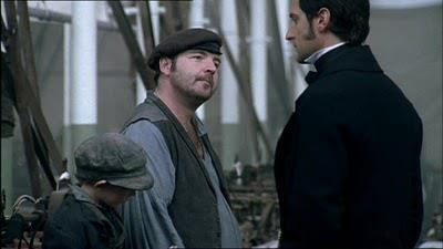Little Tom, Higgins and Thornton exchanging words in the mill.