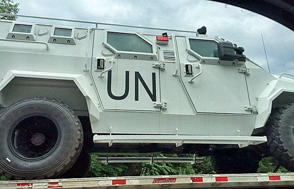 Bloggers were quick to point out the curiosity of U.N. trucks being transported on U.S. highways.