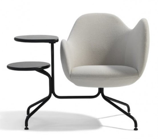 This is an amazingly simple but comfortable chair designed by Stefan T Wilmer Borselius for Bla Station Swedish furniture company. It is a multifunctional chair that allows you to work or relax with a two round tables based on your coverage. They have added new functions to the chair everyday makes it convenient and easy to work into the surface of the round table fits a laptop or a specific document, while others are perfect for holding your drink. The rotating seats are also asymmetrical let you feel comfortable, no matter how you sit. This chair is available in gray and red with a black table with white table to match any interior. As quoted by Home Model Ideas from DigsDigs (Wednesday, May 10, 2012).