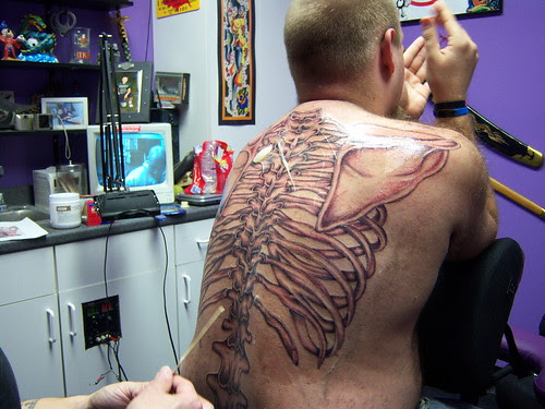  Anatomical back skeleton tattoo 