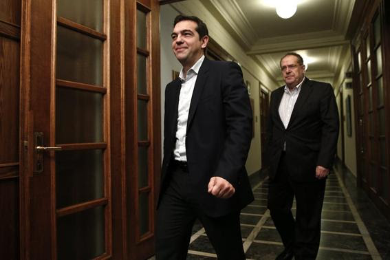 Greek Prime Minister Alexis Tsipras arrives for the first meeting of the new cabinet in the parliament building in Athens January 28, 2015. REUTERS-Alkis Konstantinidis